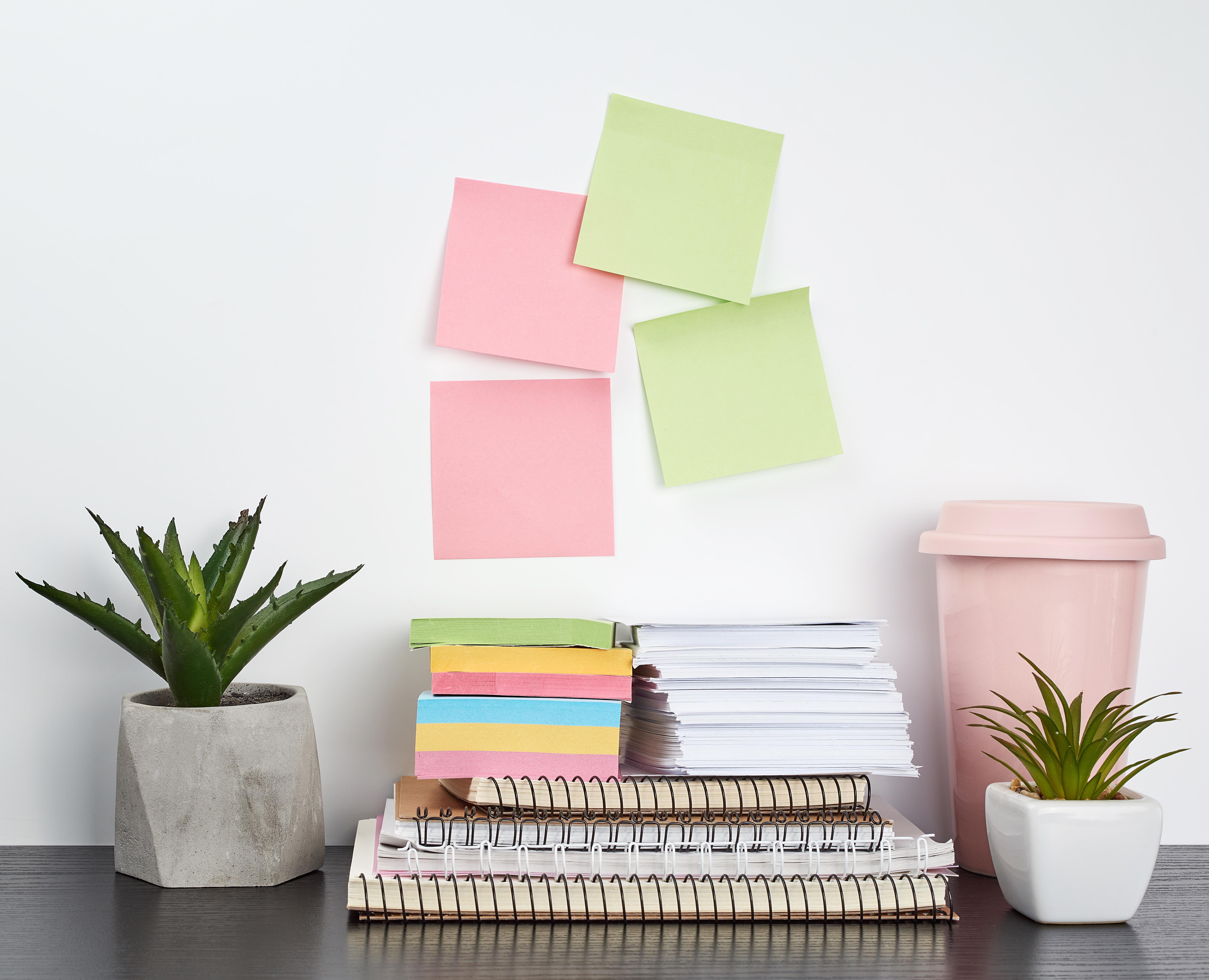 A beautifully arranged desk with various productivity tools and decor, exemplifying an ideal work environment.